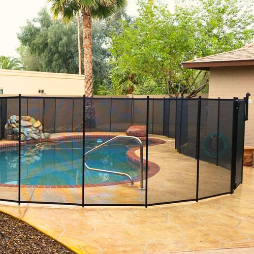 Black safety fence around swimming pool